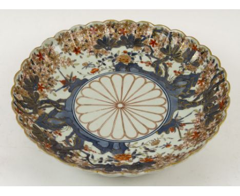 JAPANESE CHARGER, early 20th century ceramic with scalloped rim, naturalistic decoration in the Imari palette, 32.5cm diam. 