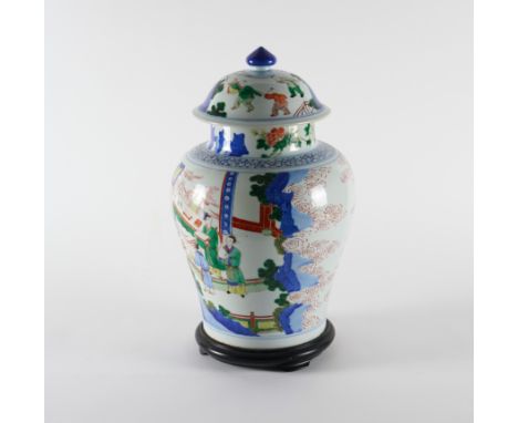 A CHINESE TRANSITIONAL STYLE `WUCAI' VASE AND COVER (3)Of baluster form, painted with dignitaries and attendants on a terrace