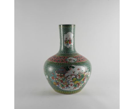 A LARGE CHINESE PORCELAIN BOTTLE VASE20th century Painted in a famille verte palette, the body with processions  inside barbe