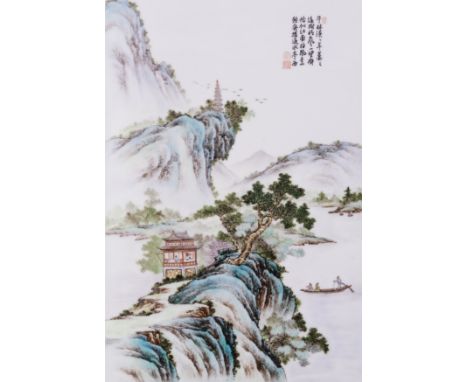 A CHINESE FAMILLE-ROSE RECTANGULAR PORCELAIN PANEL20th century Painted with an extensive landscape beneath lines of black cal