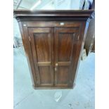 18th cent. Oak peg jointed twin door corner cupboard with original furniture and lock, the doors
