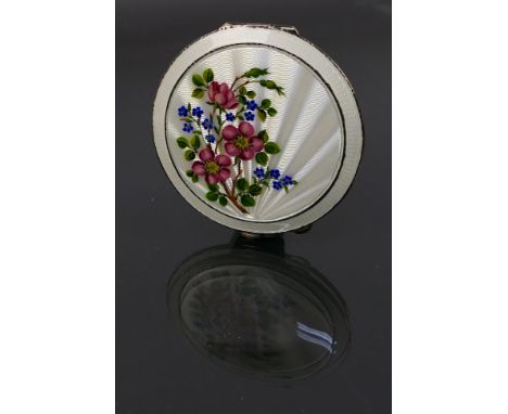 Henry Clifford Davis - A guilloche enameled powder compact with a floral display on the white enamel background. Assay marks 