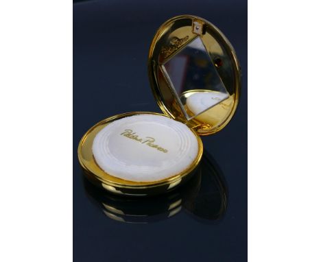 Paloma Picasso - A vintage gold coloured Paloma Picasso refillable powder compact with original fitted velvet case. It measur