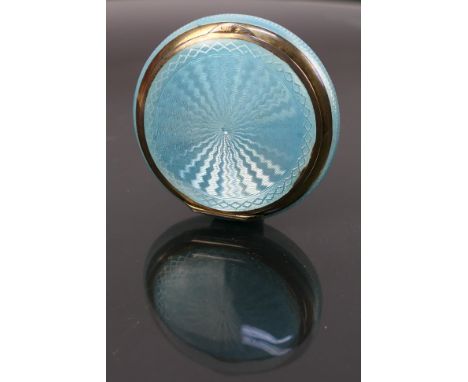 A French guilloche enamel silver powder compact circa 1910. The pale blue enamel on the lid has a small area of loss to the e