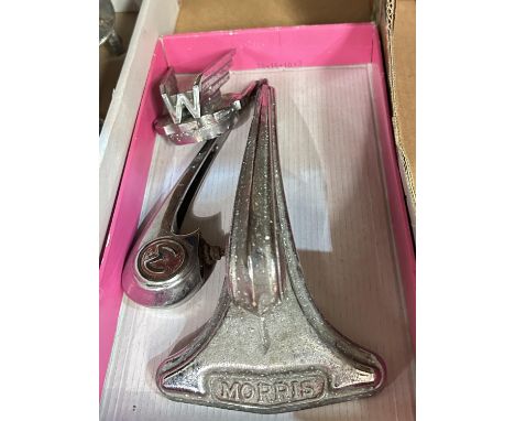 A vintage chrome Morris 1500 car mascot swoop, another similar Morris and another with wings around 'M' 
