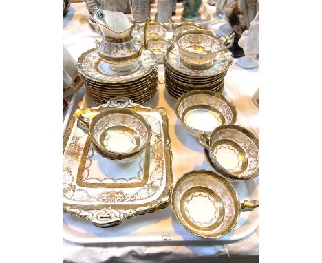 A 40 piece Cauldon gilt part tea service with milk, sugar, cups, saucers, cake plates etc The teaset appears to be in good or