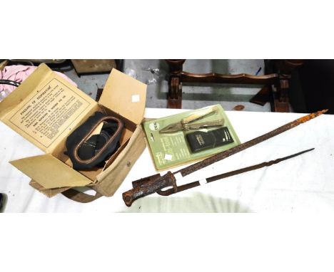 A canvas air raid gas mask, 1920's; Jack Pike multi tool, originally boxed and 2 reclaimed military bayonets (a.f.) 