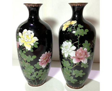 A pair of Japanese dark blue ground cloisonne baluster vases decorated with flowers height 31cm (some restoration)&nbsp;1 vas