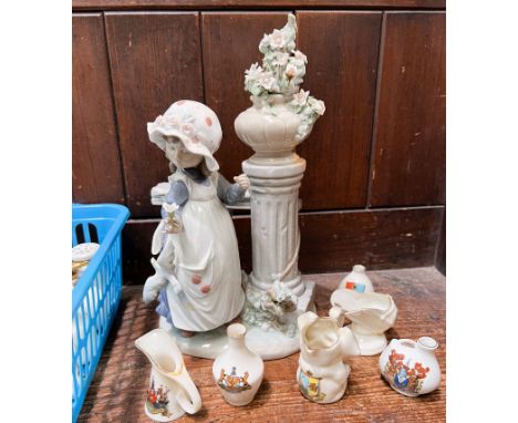 A Lladro group of young girl with wall and flower pot, No D-12 JU and a selection of Goss crested ware 