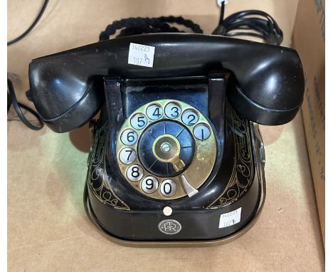 An early 20th century Jappaned rotary dial Bell telephone M F G company 