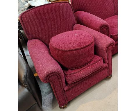 A pair of Art Deco club arm chairs in burgundy coloured moquette upholstery with oak bun feet, a matching two seater settee 1