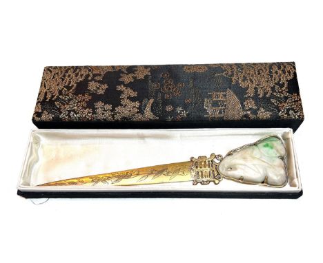 A 17th/18th century carved jade pendant mounted in 19th century silver gilt Chinese paper knife (from a private collection, f