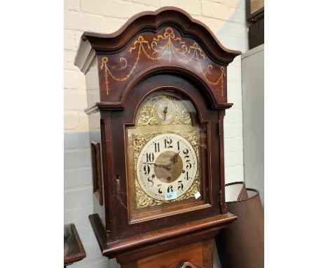 An Edwardian Sheraton style mahogany long case clock with extensive classical and floral marquetry inlay with arch top hood, 