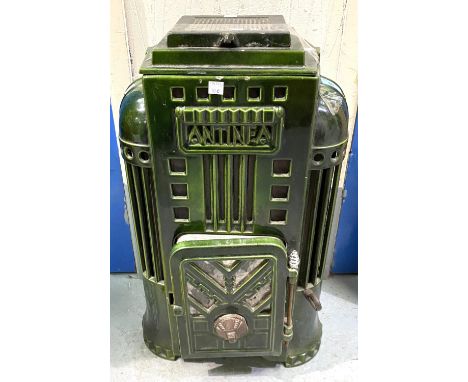 An Art Deco style log burning stove with single door, in green enamel by Antinea, height 62cm, width 35cm 