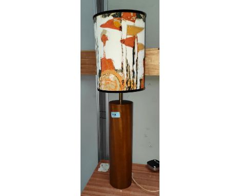 A 1960's teak cylindrical body table lamp 