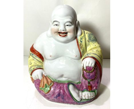 A Chinese Republic period porcelain figure of Ho Tai in seated position, with impressed seal mark to base, height 24cm.&nbsp;