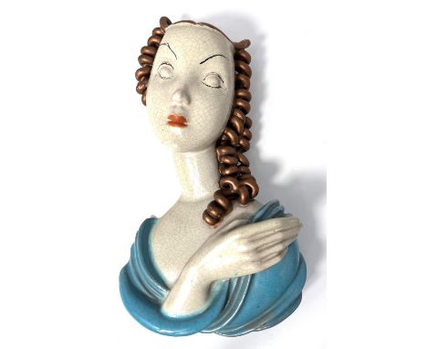 An Art Deco terracotta wall mask of female face, in the Lenci manner stamped Czechoslovakia to back, height 28cm&nbsp; &nbsp;