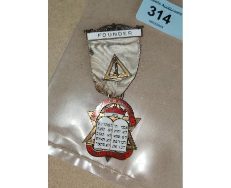 An unusual Masonic Founder hall marked silver gilt jewel Ark Chapter No 6594, with enamel Hebrew text bellow a crown 