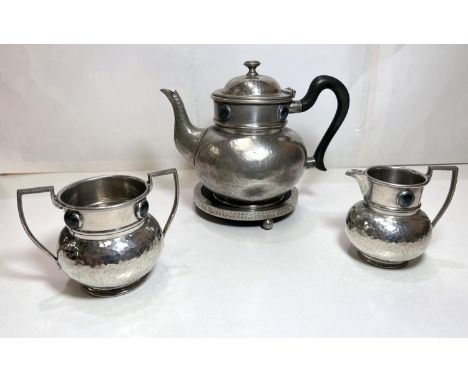 An Ashberry pewter tea service with mottled turquoise decorative beads, comprising teapot, stand, milk &amp; sugar. (No. 598)