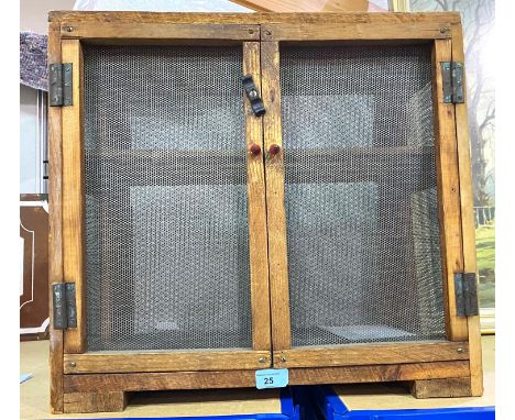 A vintage kitchen meat safe with double doors and shelves to the interior, 51x31cm 
