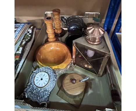 A selection of turned wood and brass candlesticks; a poker; a reproduction copper lamp; etc. 