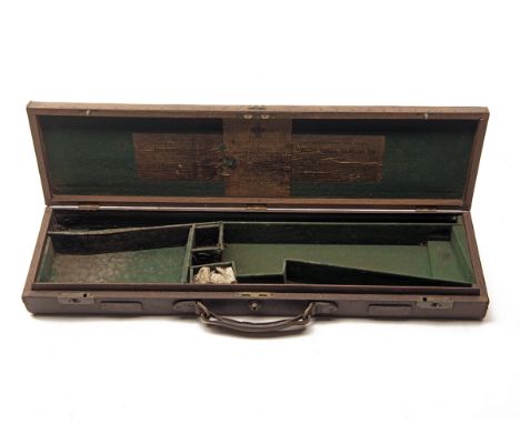 WESTLEY RICHARDS A LEATHER-BOUND OAK SINGLE GUNCASE, fitted for 30in. barrels, (could adjust to 31in.). the interior re-lined