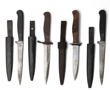 A COLLECTION OF FOUR GERMAN WORLD WAR ONE TRENCH or BOOT KNIVES, one signed 'ERNST BUSCH', another 'ERL', the last two unsign
