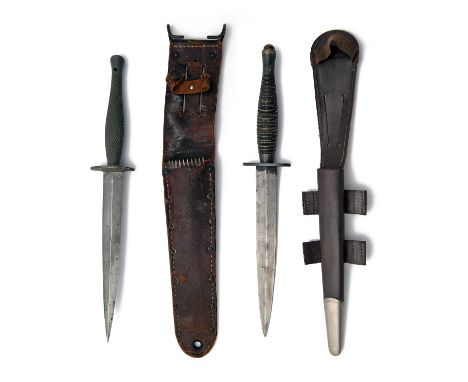 TWO RARE MILITARY DAGGERS, both World War Two vintage, the first a Fairburn-Sykes with variant 'dot and ring' handle, blade c