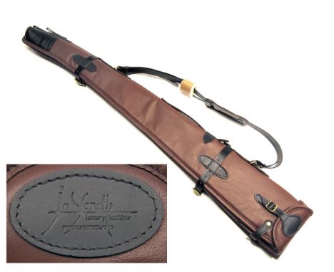 JOANNE YORATH A NEW AND UNUSED CHESTNUT LEATHER FLEECE-LINED DOUBLE GUNSLIP, with leather shoulder strap and brass fittings, 
