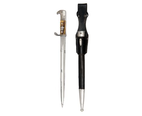 P.E. LUNESCHLOSS, SOLINGEN A WW2 PERIOD POLICE BAYONET WITH SOLID NICKEL FURNITURE, with a birds head hilt with stag grips, P