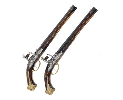 J.J. KUCHENREUTER, GERMANY A FINE PAIR OF 36-BORE FLINTLOCK HOLSTER-PISTOLS WITH GILT MOUNTS, no visible serial numbers, circ