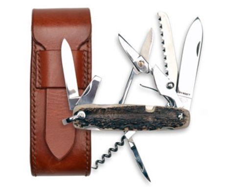 JAMES PURDEY & SONS AN UNUSED STAG HORN MULTI-TOOL POCKET KNIFE, a hand-made nine piece tool with large and small blades, saw