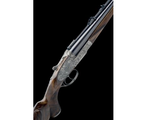 HOLLAND & HOLLAND A FINE, GRIFNEE-ENGRAVED 7X57R ROYAL 'MODEL DE LUXE' SIDELOCK EJECTOR DOUBLE RIFLE, serial no. 35607, 24in.