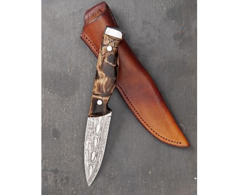 WILLIAM & SON, LONDON A FINE DAMASCUS DROP-POINT HUNTING KNIFE WITH FOSSILISED MAMMOTH-TUSK HILT, ref. WR001535, serial no. 0