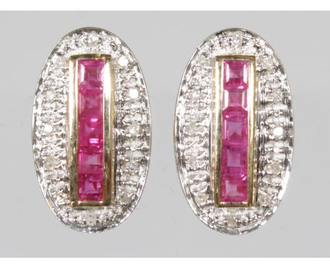 A PAIR OF 9CT GOLD FIVE CALIBRE CUT RUBY AND DIAMOND ART DECO DESIGN EARRINGS.  