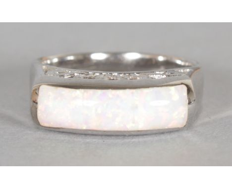 A GILSON OPAL RING set in silver.  