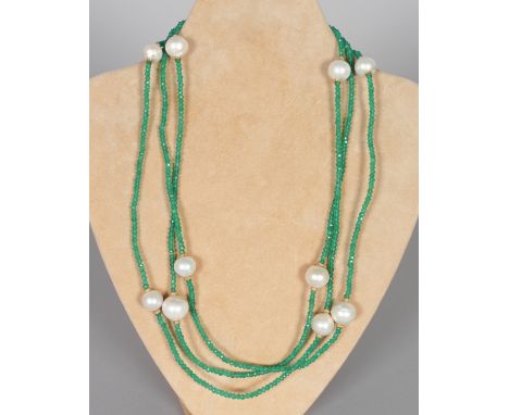 AN ADVENTURINE FACETED GEM SET AND CULTURED PEARL ROPE NECKLACE.  