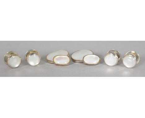 A SET OF MOTHER-OF-PEARL STUDS AND CUFFLINKS.  