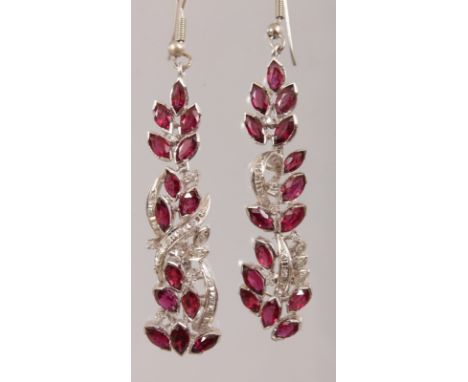 A SUPERB PAIR OF 18CT WHITE GOLD AND RUBY DROP EARRINGS.  