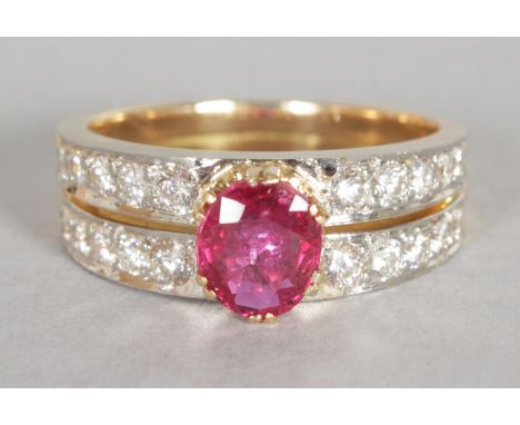 A SUPERB RUBY AND DIAMOND RING, central ruby 1.68CTs and two rows of diamonds in yellow gold.  