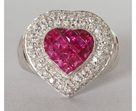 A GOOD 18CT WHITE GOLD, RUBY AND DIAMOND HEART SHAPED RING.  