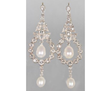 A PAIR OF 9CT GOLD AND SILVER PEARL AND BRILLIANT DROP EARRINGS.  