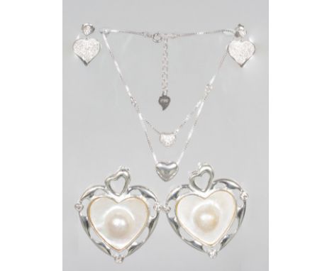TWO SILVER AND MOTHER-OF-PEARL HEART SHAPED PENDANTS, BRACELET AND EARRINGS.  