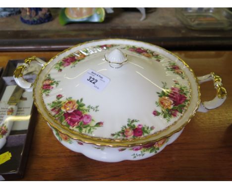 A Royal Albert tea and dinner service, including two tureens and covers, a Royal Worcester cakestand and various Royal Albert