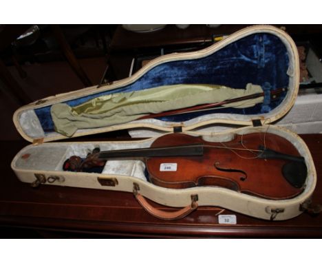 Violin bearing label Degani Guidio di Eugenio and a bow, cased