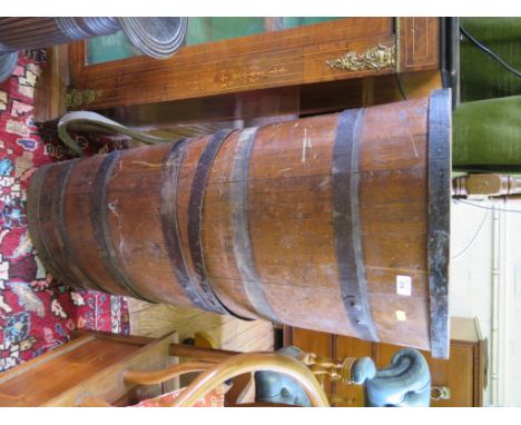 A metal bound timber grape hopper with leather shoulder straps, 94cm high