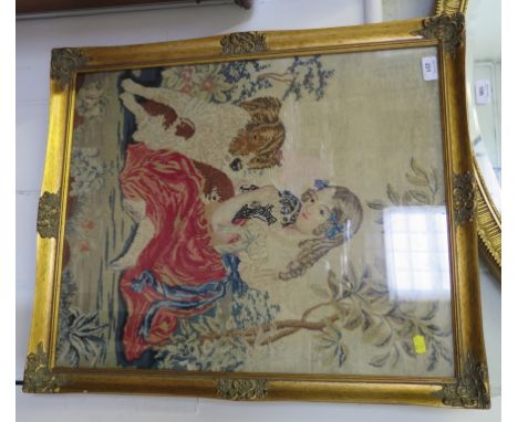 A 19th century wool work tapestry depicting a girl with her dogs, 60cm x 49cm, and a tapestry and gilt metal bell pull, 123cm