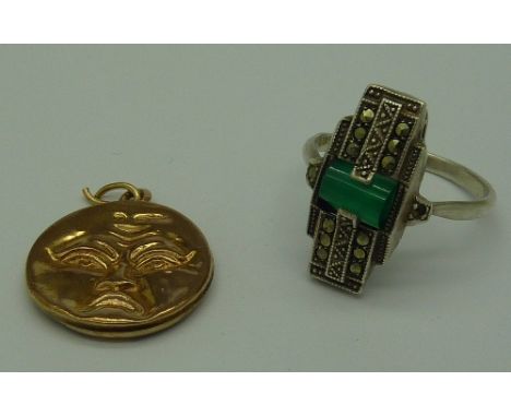 A 9ct gold man in the moon pendant and a .935 silver, green stone and marcasite Art Deco ring, weight of pendant 1g, ring siz