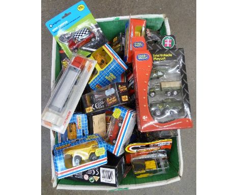 A large collection of diecast vehicles including Maisto and Chad Valley