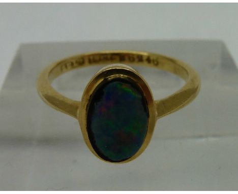 An 18ct gold and opal ring, weight 2.4g, size K